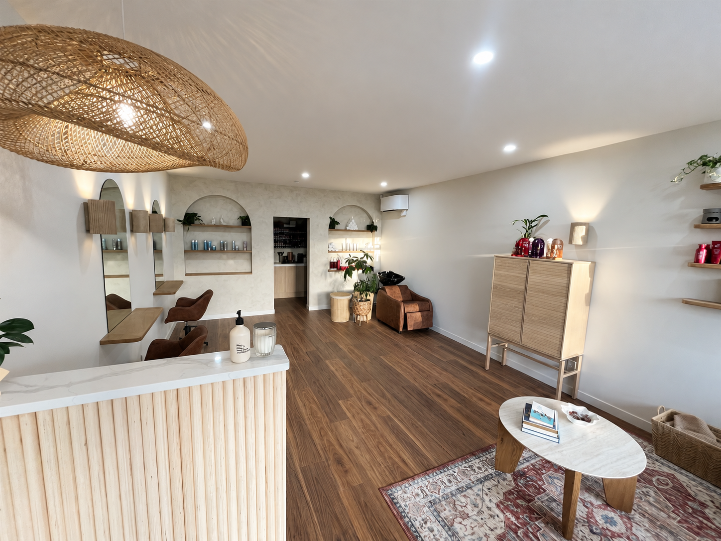 Flux salon fitout with timber joinery and warm interior finishes